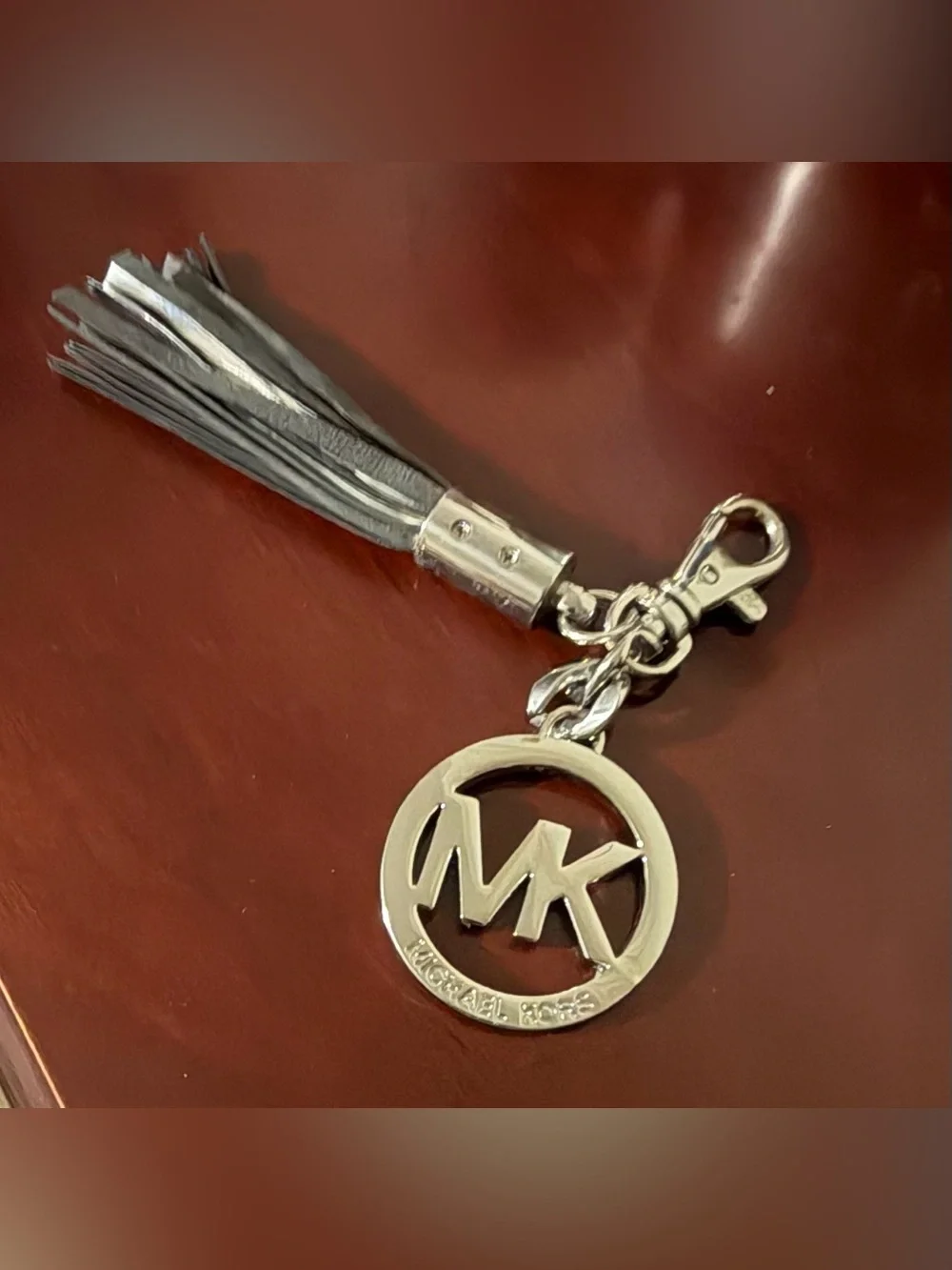 Michael Kors Silver Logo Tassel Key Charm